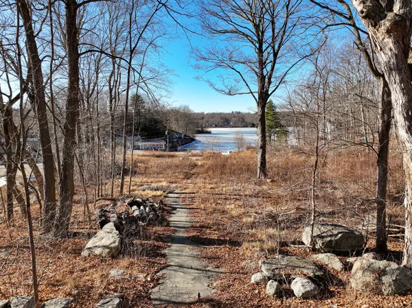 a view of a wooden floor with a yard