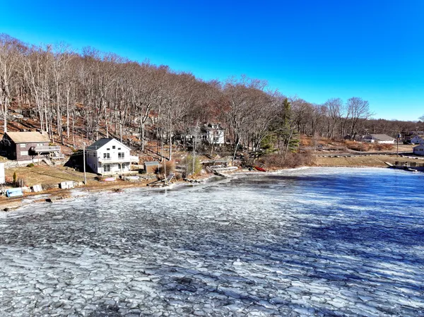 a view of a road with an ocean view