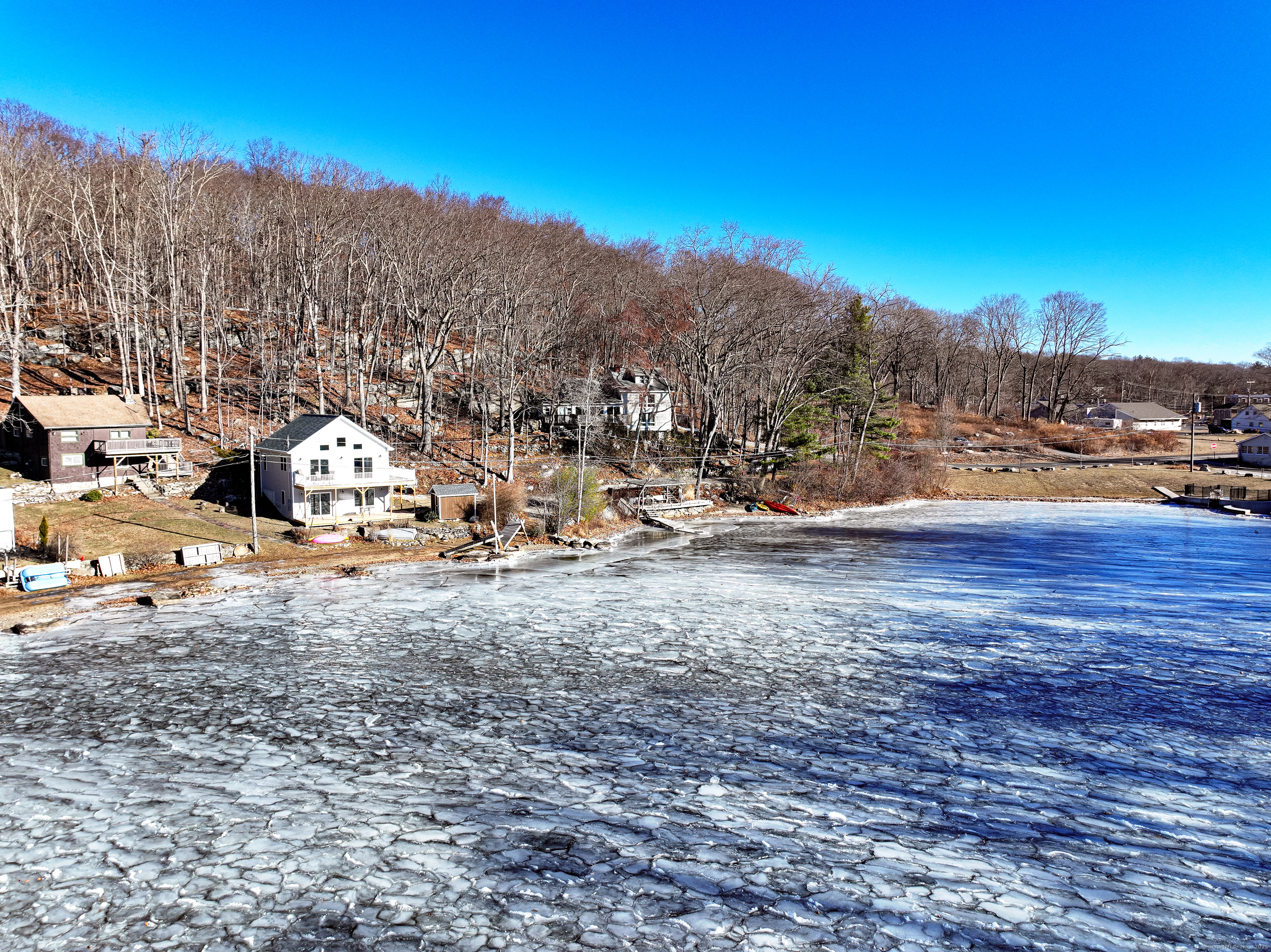 0 Woodland Road Coventry, CT 06238 - Photo 7 of 8 a view of a town with big trees