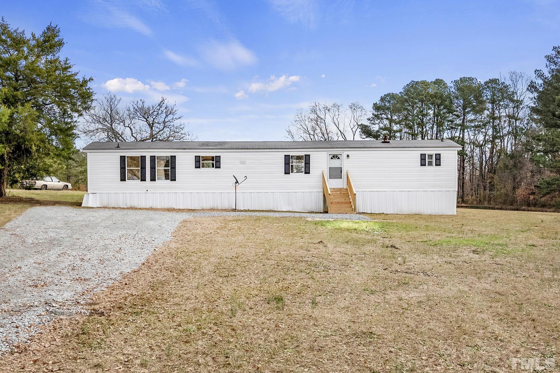 4920 Zacks Mill Road Angier, NC 27501 - Photo 1 of 30 front view of house with a yard