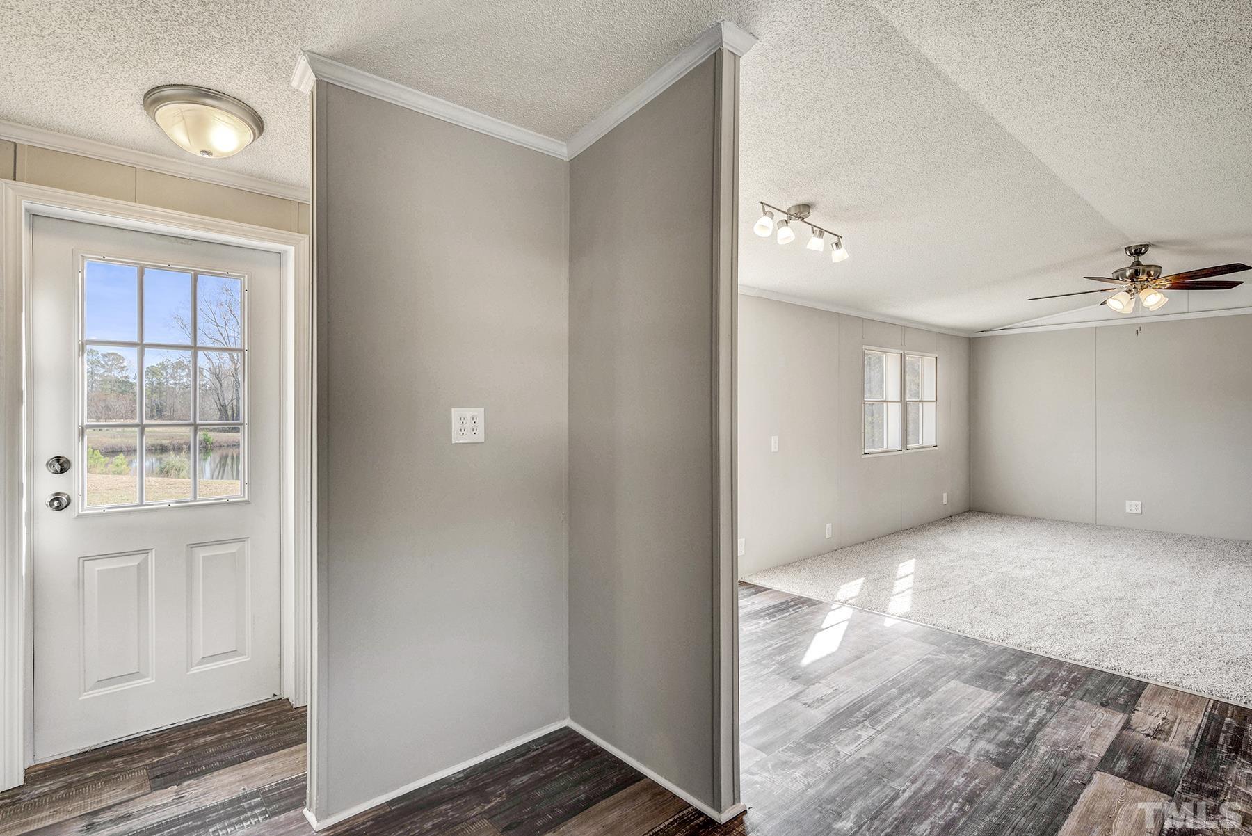 4920 Zacks Mill Road Angier, NC 27501 - Photo 15 of 30 a view of an empty room and window