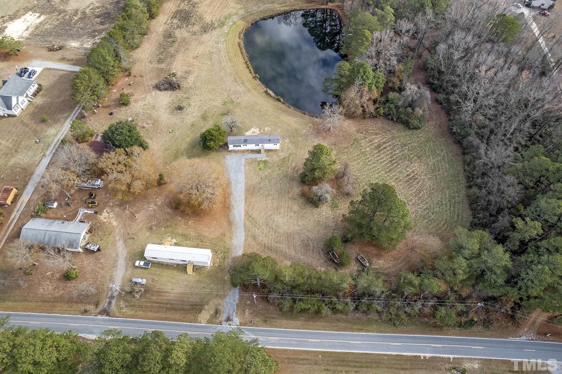 4920 Zacks Mill Road Angier, NC 27501 - Photo 23 of 30 an aerial view of a house with a yard