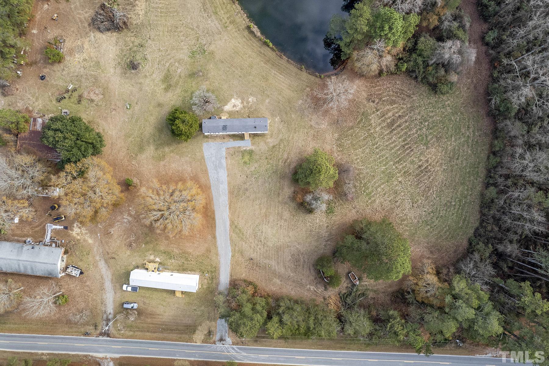4920 Zacks Mill Road Angier, NC 27501 - Photo 26 of 30 front view of a house with a yard