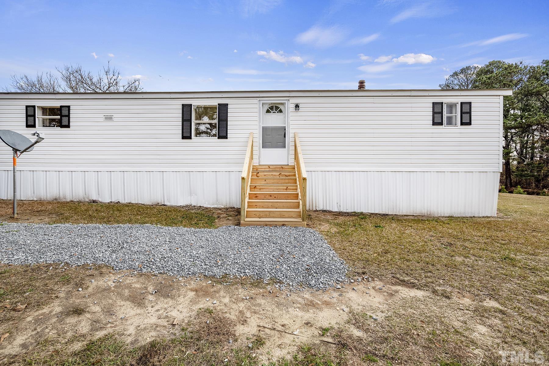 4920 Zacks Mill Road Angier, NC 27501 - Photo 4 of 30 a view of a backyard