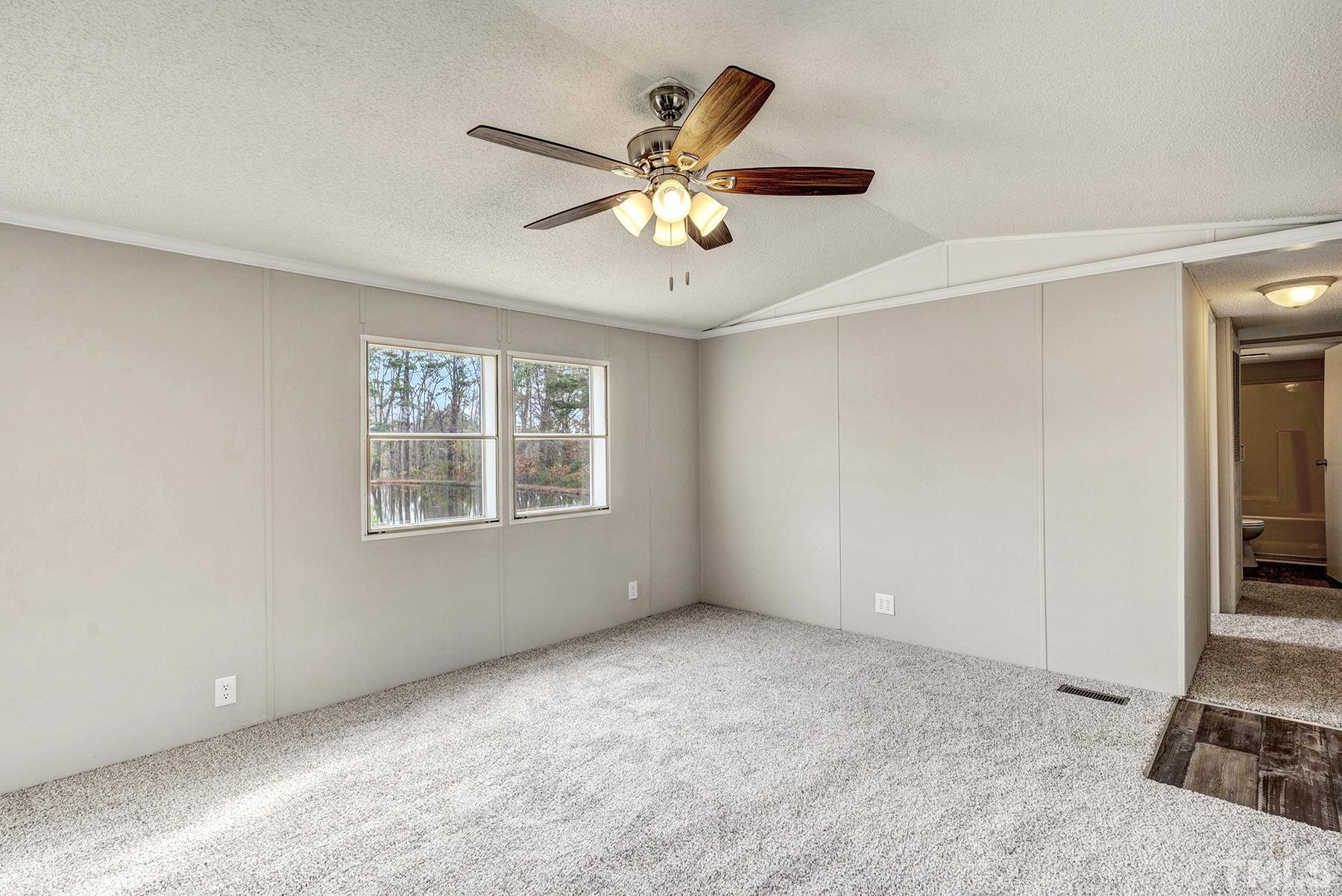 4920 Zacks Mill Road Angier, NC 27501 - Photo 5 of 30 a view of an empty room with a window