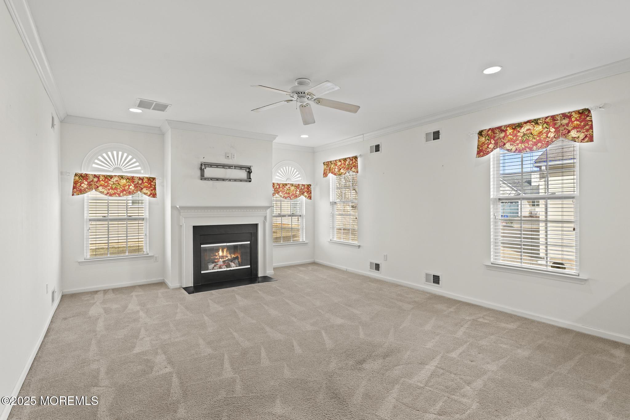 24 Battle Road Manchester Township, NJ 08759 - Photo 13 of 30 an empty room with windows and fireplace