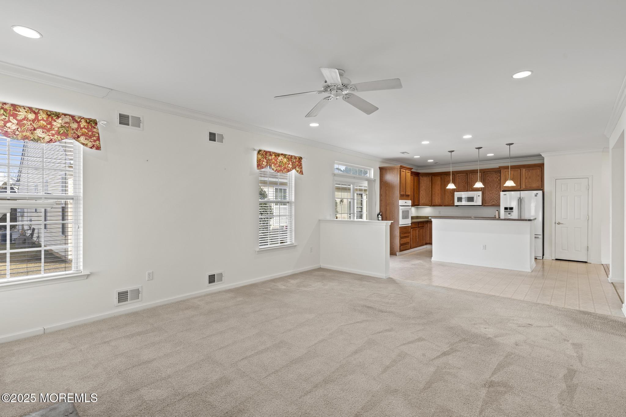 24 Battle Road Manchester Township, NJ 08759 - Photo 16 of 30 a view of a kitchen with a sink and a window
