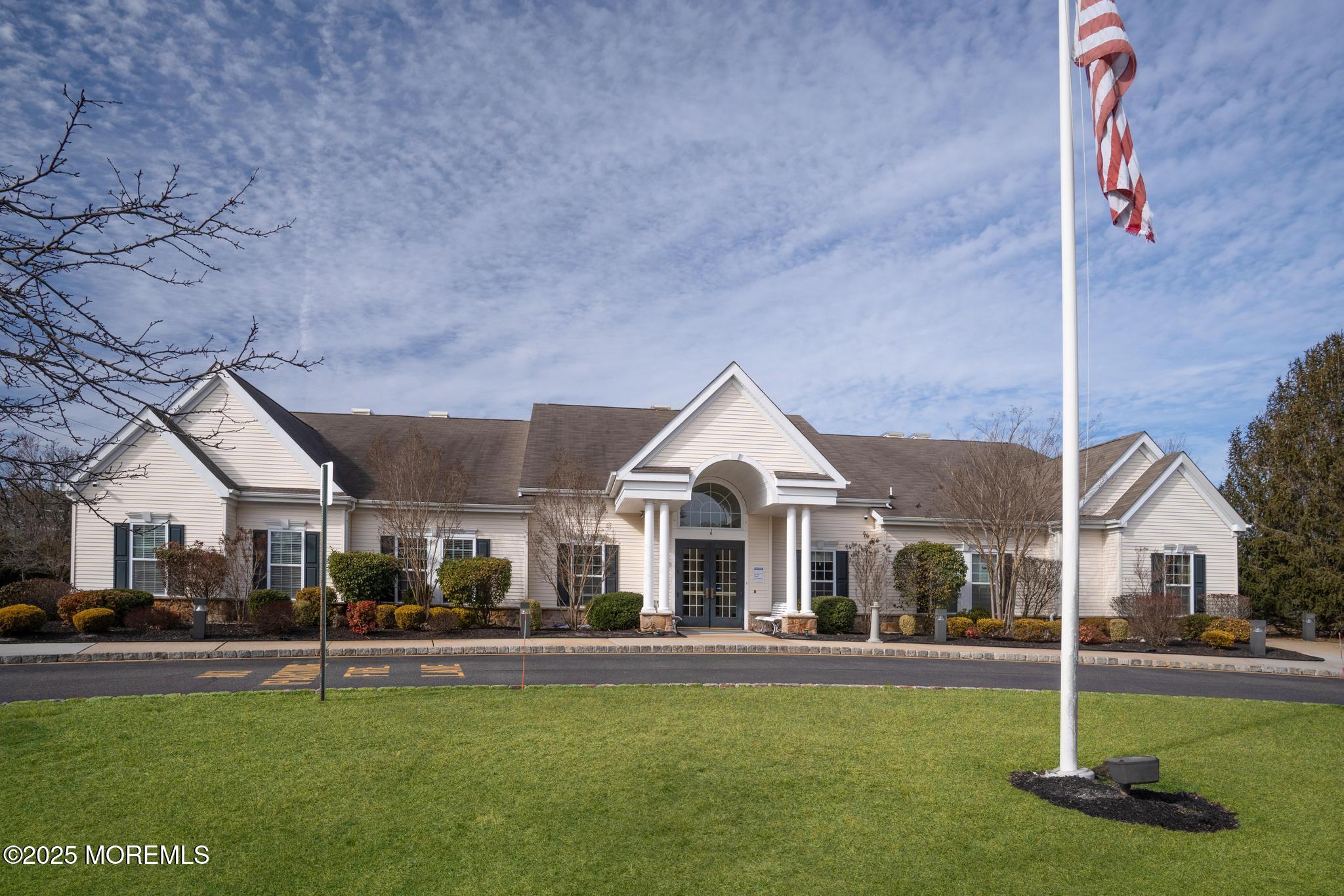24 Battle Road Manchester Township, NJ 08759 - Photo 29 of 30 a front view of a house with swimming pool garden and patio