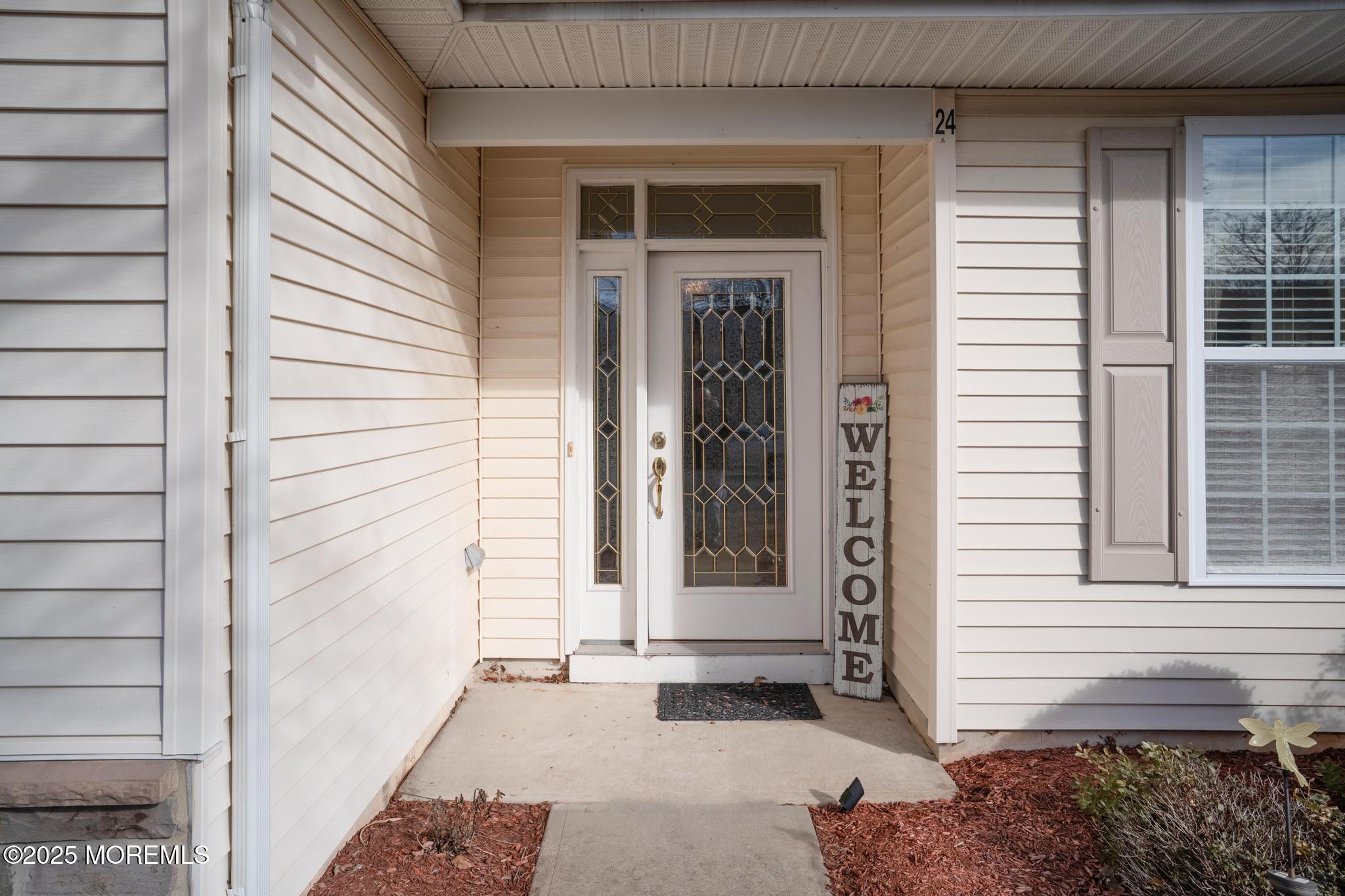 24 Battle Road Manchester Township, NJ 08759 - Photo 6 of 30 a view of house with a door and a window