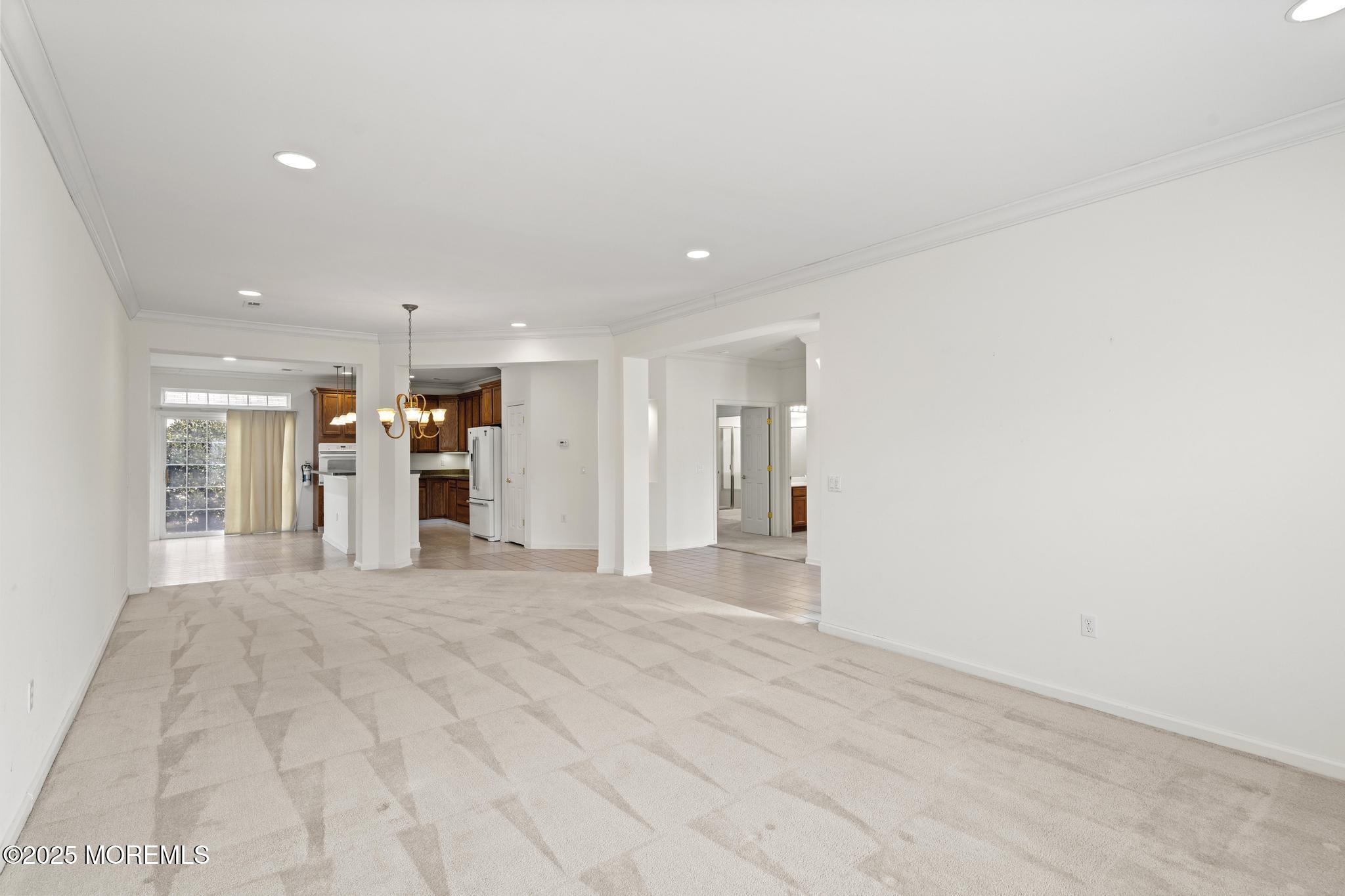 24 Battle Road Manchester Township, NJ 08759 - Photo 8 of 30 a view of an empty room with wooden floor