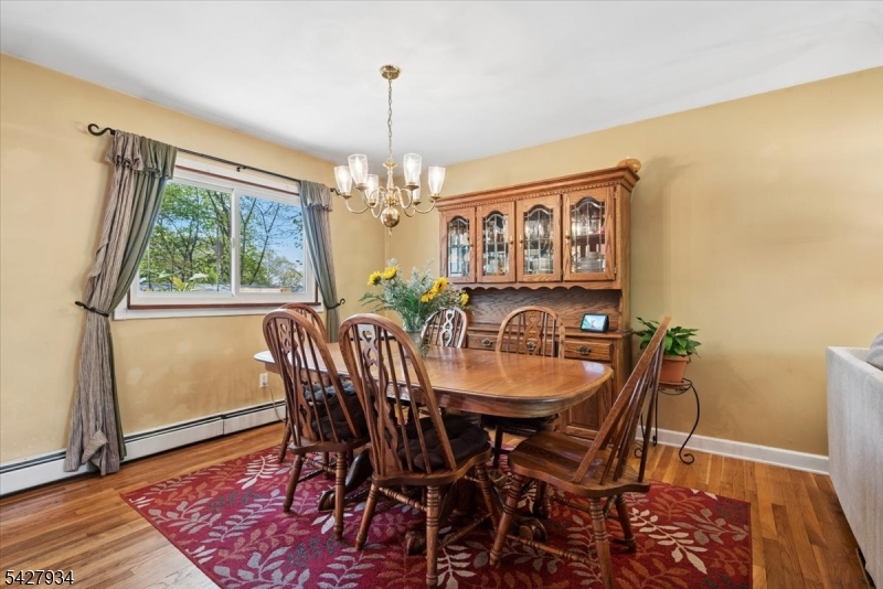 77 Brooklyn Road Stanhope, NJ 07874 - Photo 8 of 27 a view of a dining room with furniture window and wooden floor