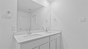119 Morning Glory Loop Kyle, TX 78640 - Photo 13 of 24 Bathroom featuring double vanity