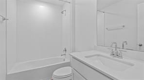 119 Morning Glory Loop Kyle, TX 78640 - Photo 17 of 24 Full bathroom featuring vanity and bathtub / shower combination