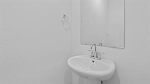 119 Morning Glory Loop Kyle, TX 78640 - Photo 19 of 24 Half bath with a sink