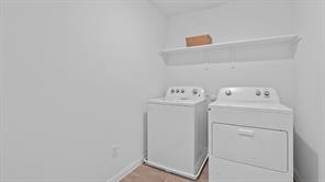 119 Morning Glory Loop Kyle, TX 78640 - Photo 20 of 24 Laundry area featuring washer and clothes dryer