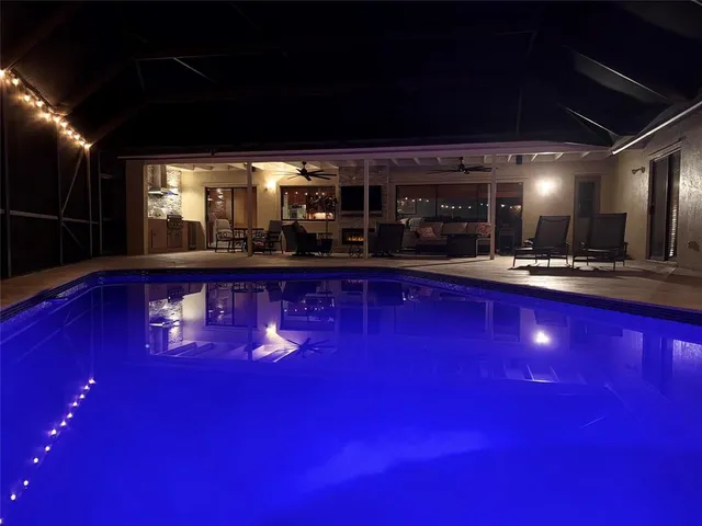 a kitchen with lots of counter top space and windows