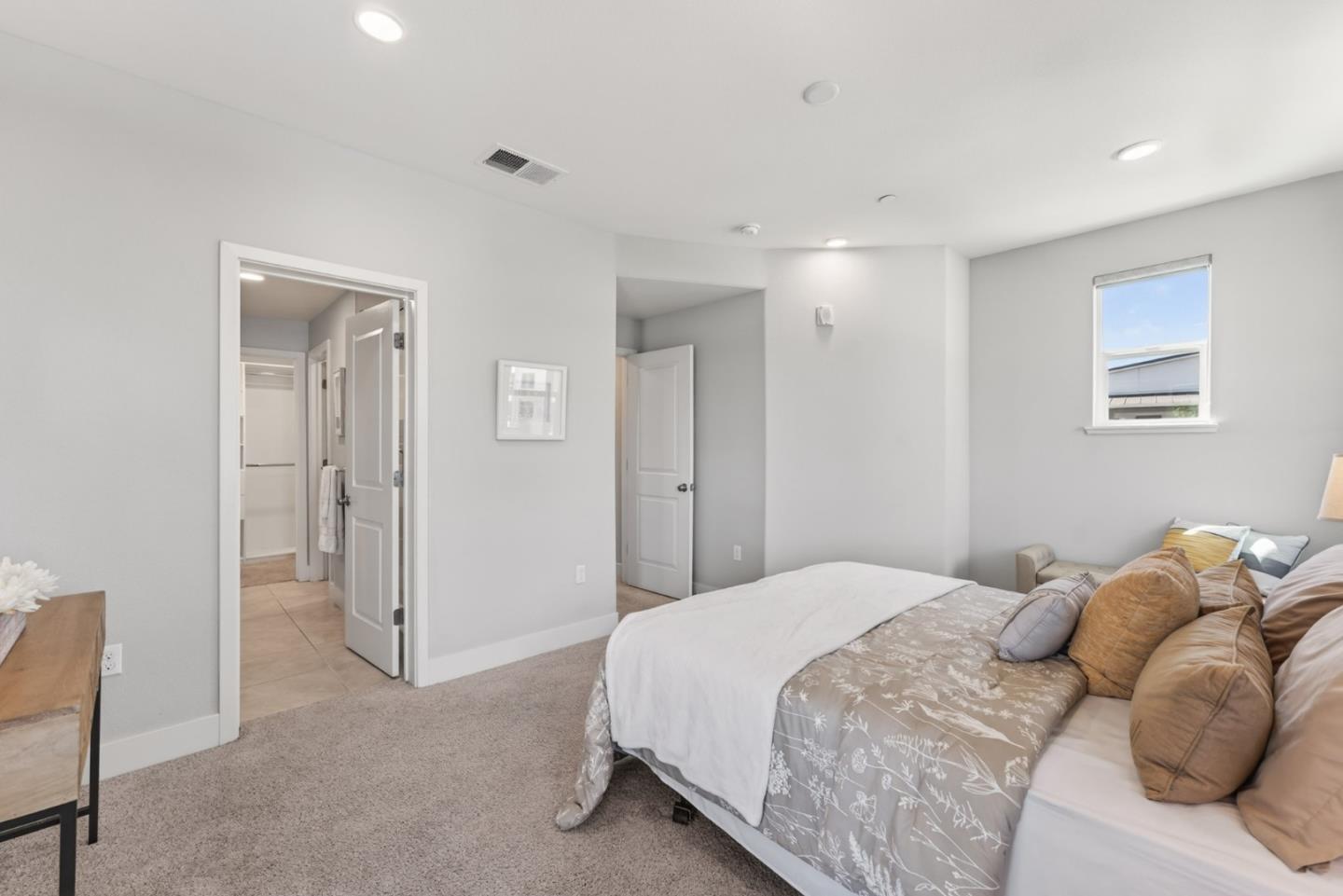 202 Market Street Milpitas, CA 95035 - Photo 9 of 30 a bedroom with a bed and a window