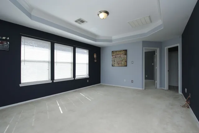 an empty room with windows