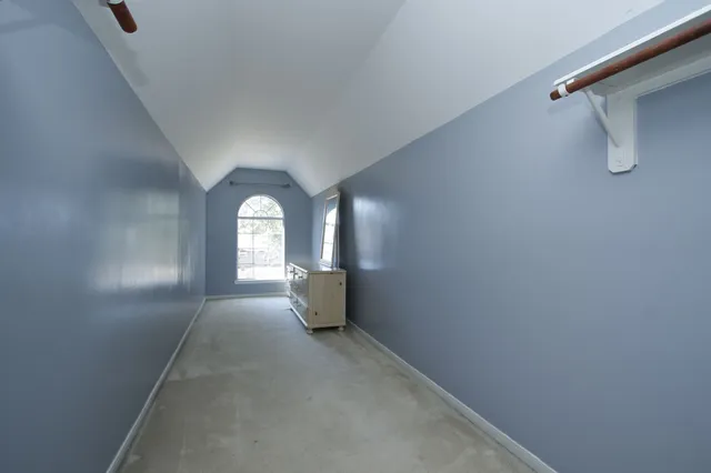 a view of a windows and chandelier in a room