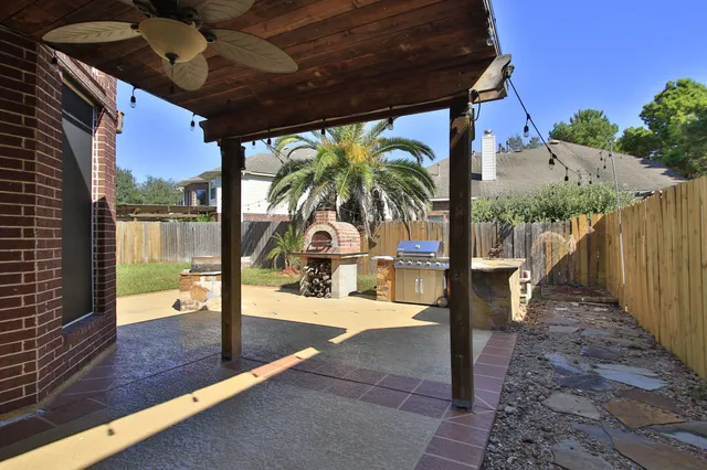 a view of swimming pool with outdoor seating