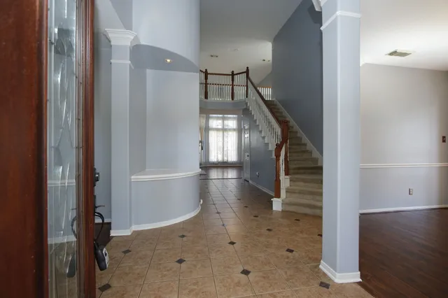 a view of entryway with stairs