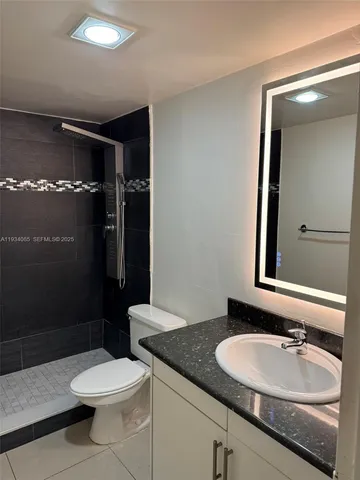 a room with a door and a hallway