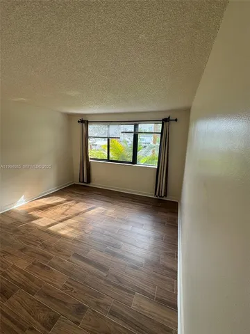 a view of a lake with a city