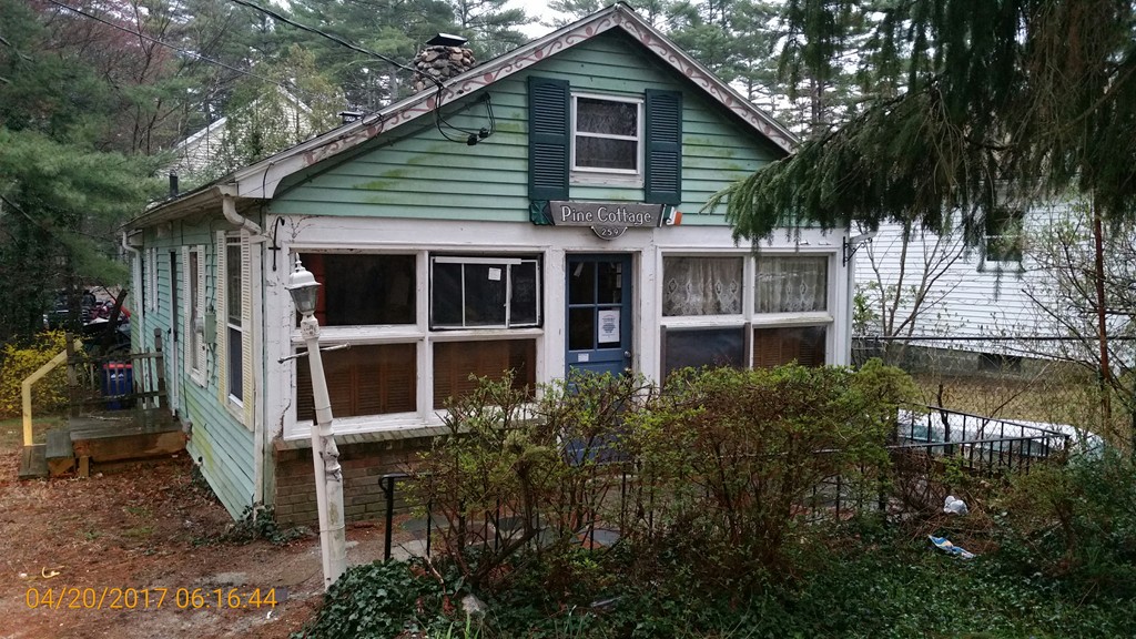 259 Park Avenue Wareham, MA 02538 - Photo 1 of 13 a view of a house with many windows and plants