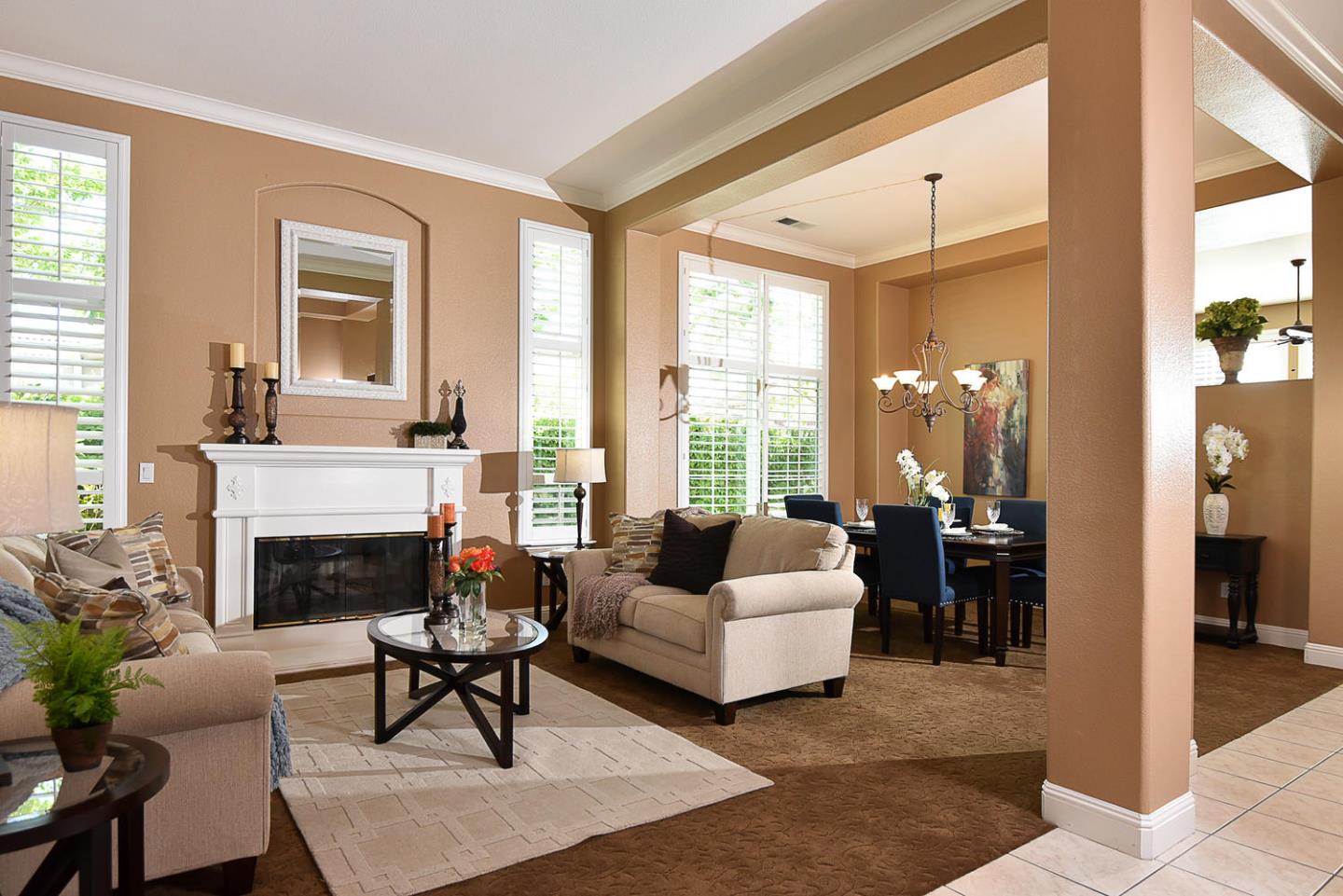 1492 Red Tail Place Morgan Hill, CA 95037 - Photo 7 of 25 a living room with furniture and a fireplace