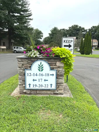 a view of swimming pool with a yard and sitting area