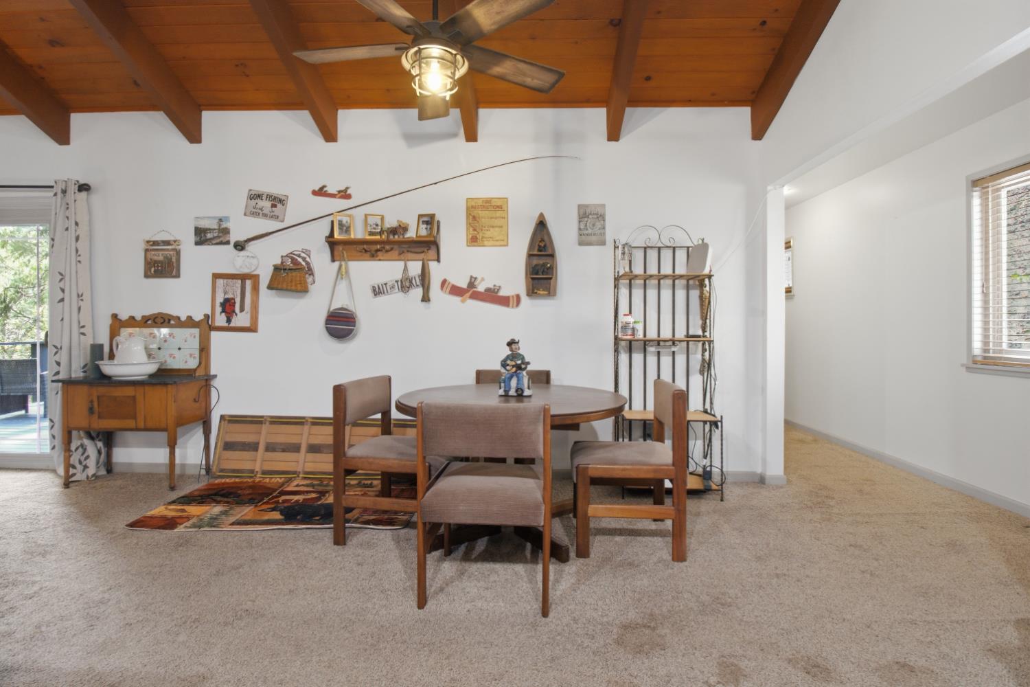 4599 Rivendale Road Placerville, CA 95667 - Photo 9 of 27 a living room with furniture and a chandelier