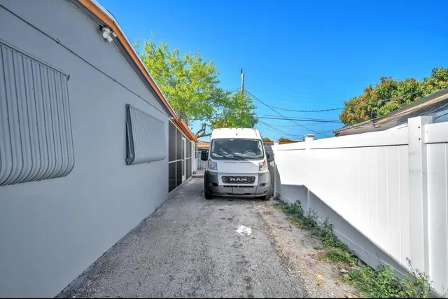 a view of a house with a back yard