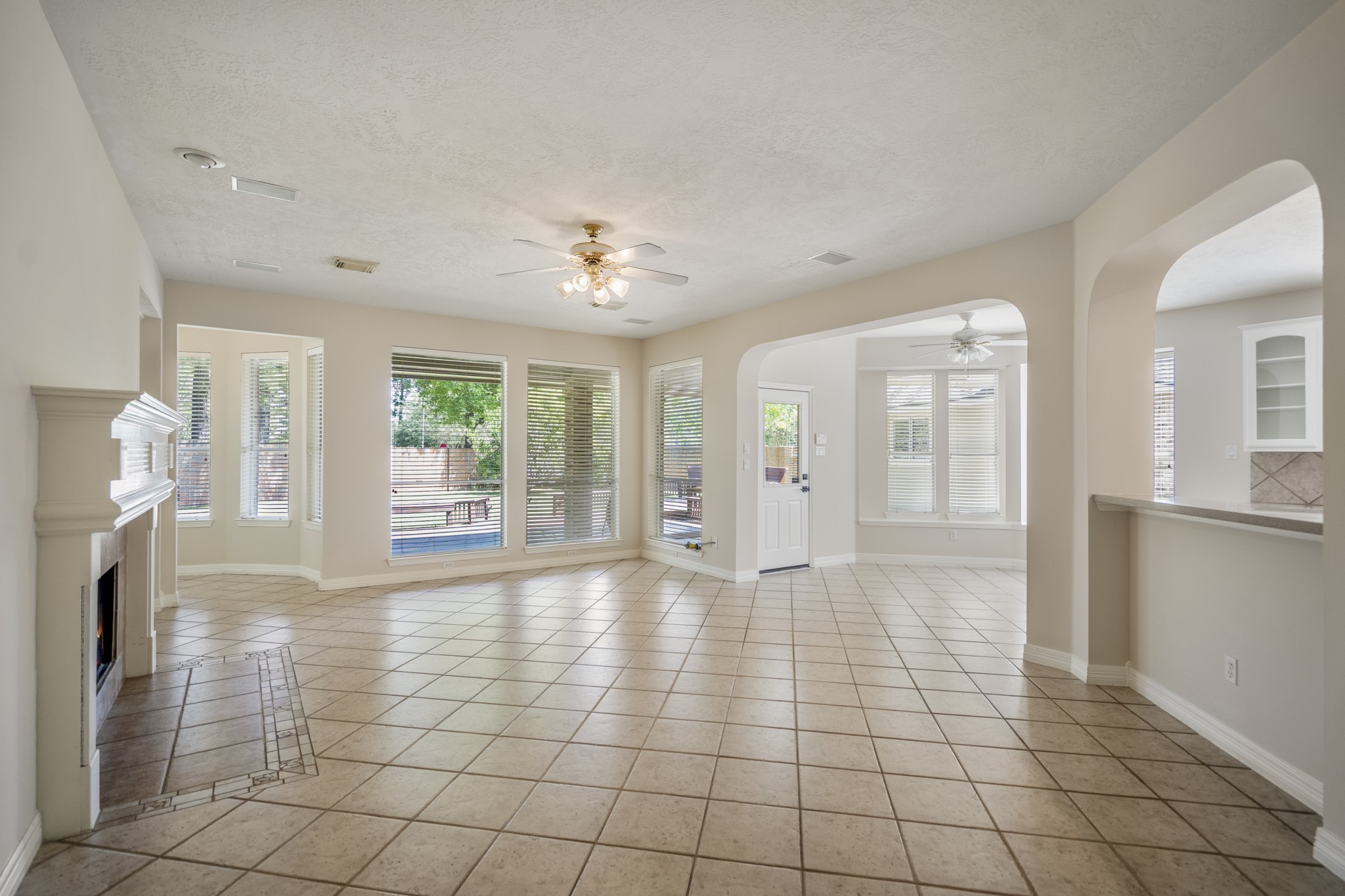 1322 Cardigan Bay Circle Spring, TX 77379 - Photo 13 of 50 On the right wall, there is a classic white mantel fireplace with gas connections, a stunning area to showcase your holiday decor.