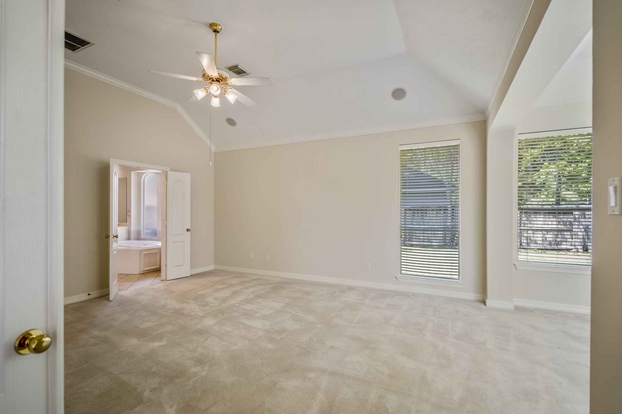 1322 Cardigan Bay Circle Spring, TX 77379 - Photo 21 of 50 Step into a tranquil and spacious primary suite that has beautiful view of the backyard, while enjoying the extra space for a sitting area or nursery.