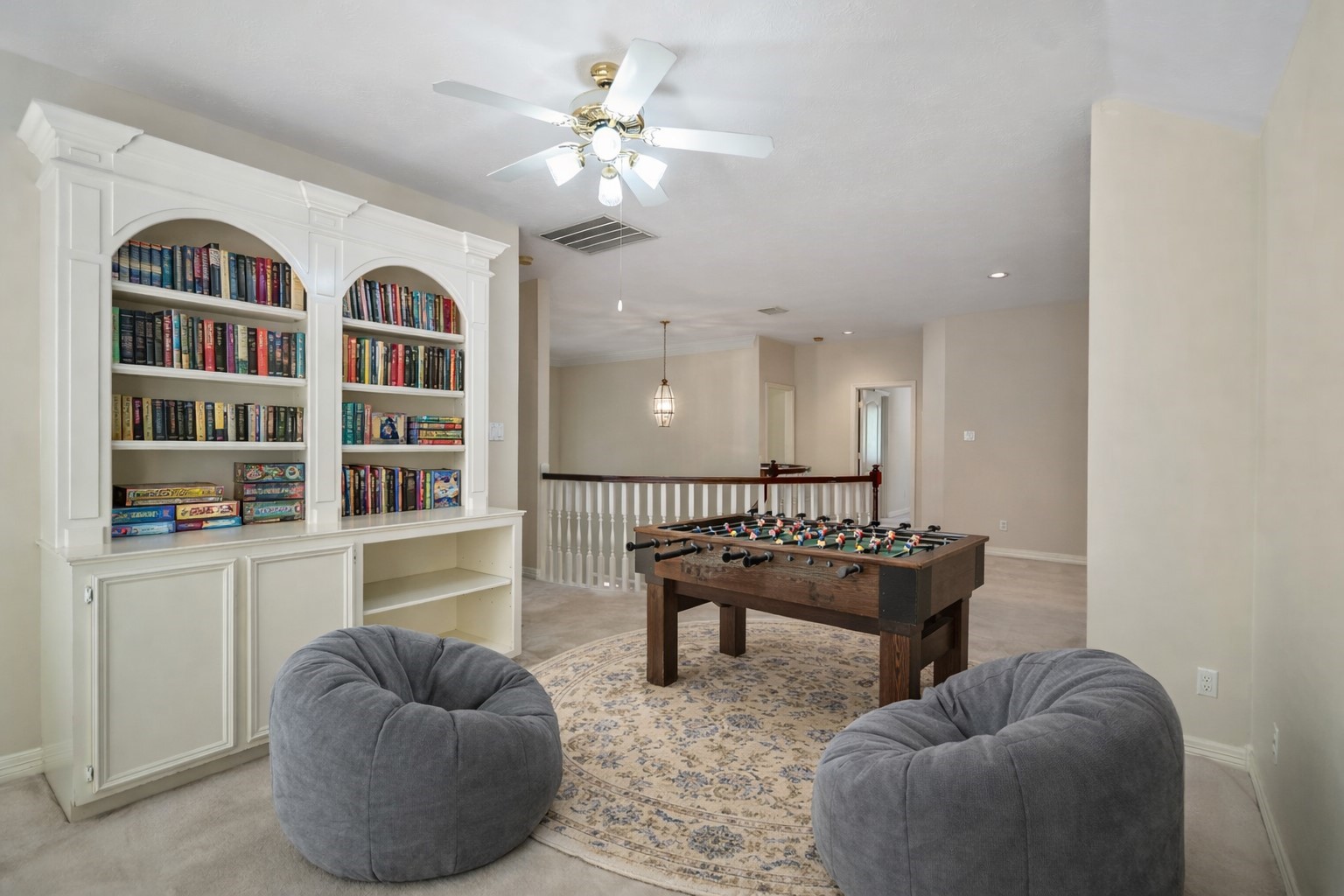 1322 Cardigan Bay Circle Spring, TX 77379 - Photo 29 of 50 The upstairs game room provides plenty of space for you to create an entertainment area for your family to enjoy, here it has been virtually staged, to give you an idea of the possibilities.