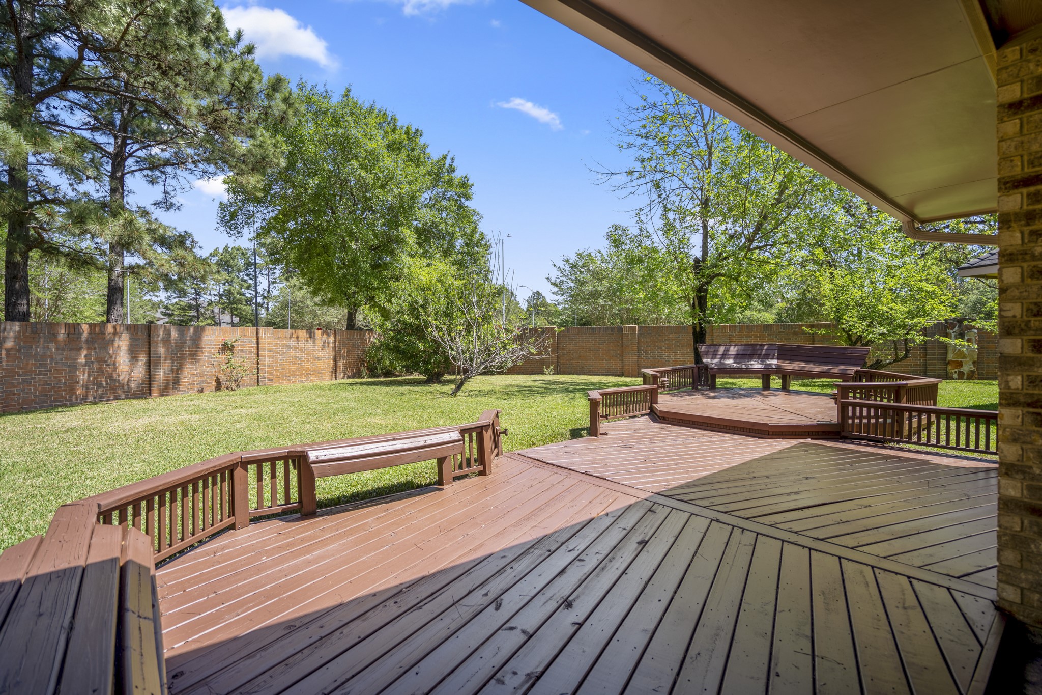 1322 Cardigan Bay Circle Spring, TX 77379 - Photo 36 of 50 The wood perimeter benches are a huge plus for families or people who love to host, as they provide plenty of seating without cluttering the deck with extra furniture