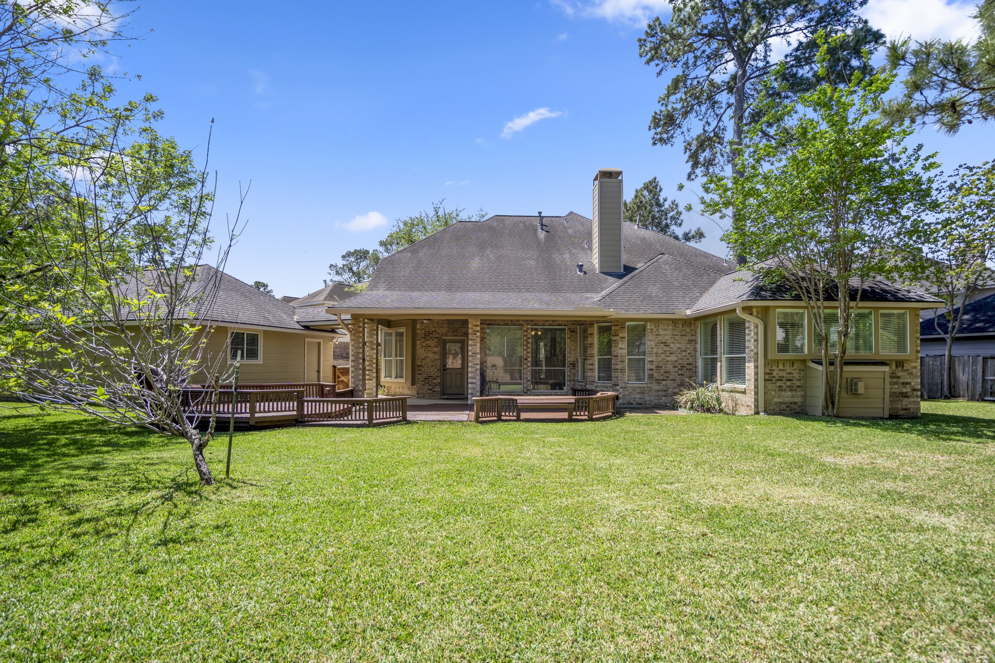 1322 Cardigan Bay Circle Spring, TX 77379 - Photo 37 of 50 A view of the back of the home, showing the huge backyard that offers your family the option of putting in a pool with plenty of space to spare.