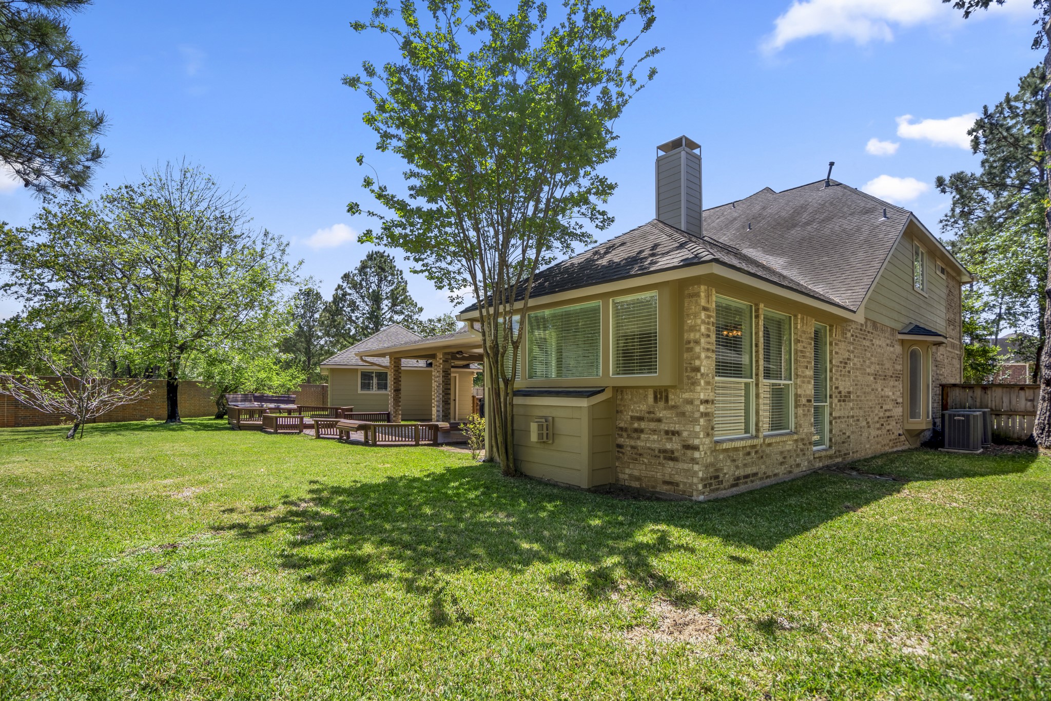 1322 Cardigan Bay Circle Spring, TX 77379 - Photo 38 of 50 You get to enjoy the beautiful established shade trees, no backyard neighbors; a large storage shed, all appliances included, an updated HVAC system, ROOF & brick fence. Summertime is for fun when you live here.