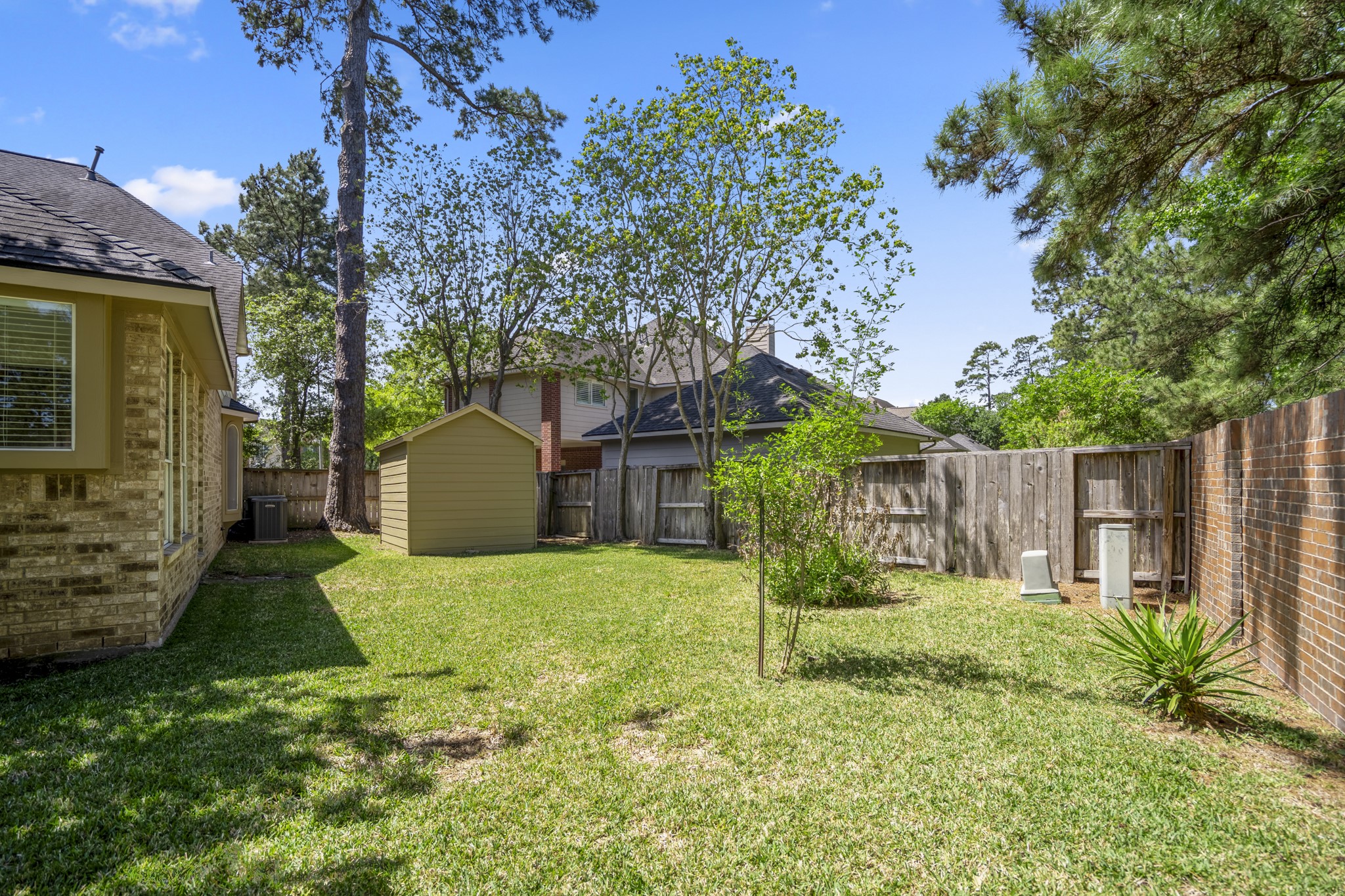 1322 Cardigan Bay Circle Spring, TX 77379 - Photo 39 of 50 Here you can see the storage shed, which is included in the home, you could use this section for a vegetable or herb garden.