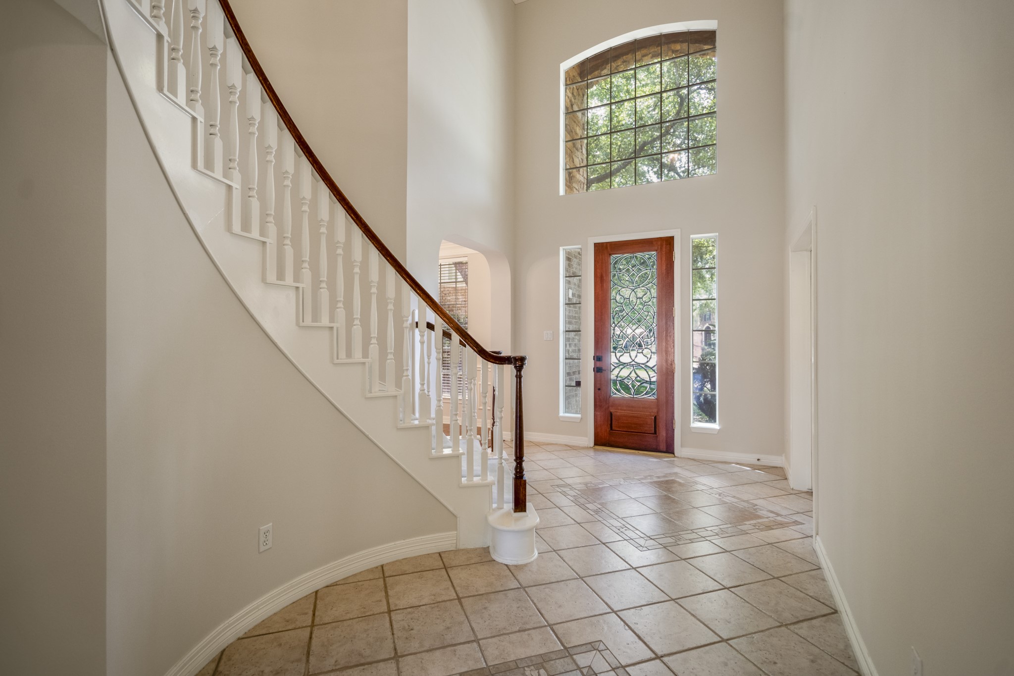 1322 Cardigan Bay Circle Spring, TX 77379 - Photo 6 of 50 The light drenched foyer offers a large greeting area for your guests and plenty of natural light streams into the entry.