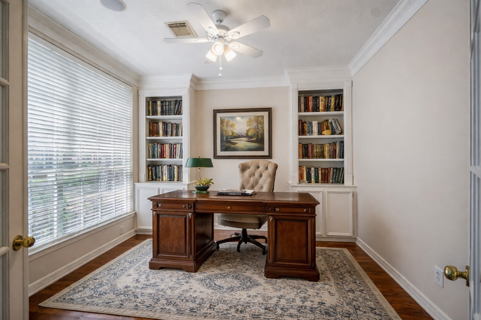 1322 Cardigan Bay Circle Spring, TX 77379 - Photo 7 of 50 French doors lead into the study which features custom built-ins, wood flooring and large windows. This room is virtually staged.