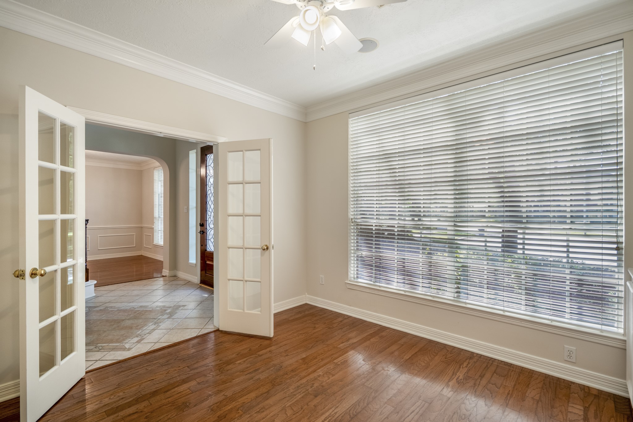 1322 Cardigan Bay Circle Spring, TX 77379 - Photo 9 of 50 The French doors offer you privacy, the crown moldings and large window elevate the study - so easy to customize.