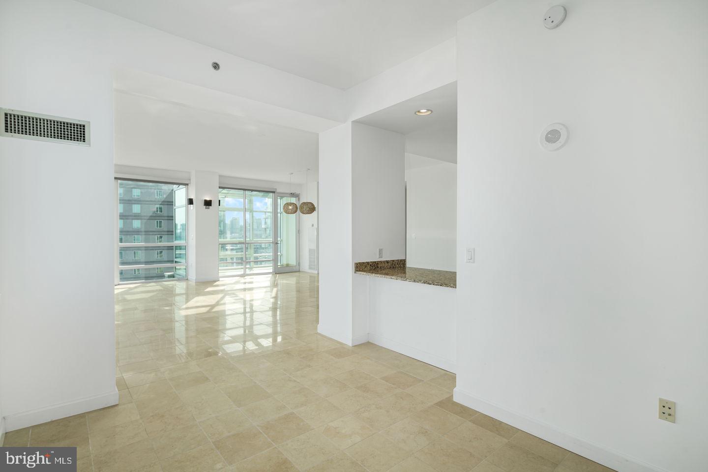 901 North Penn Street, Unit R1802 Philadelphia, PA 19123 - Photo 13 of 32 a view of empty room with floor to ceiling window