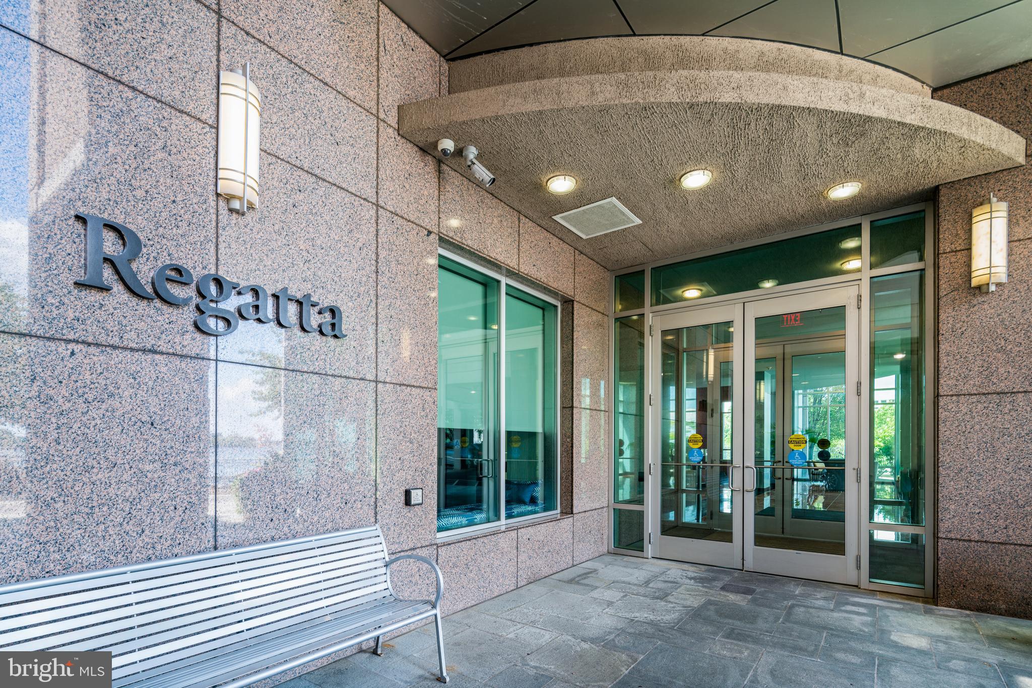 901 North Penn Street, Unit R1802 Philadelphia, PA 19123 - Photo 2 of 32 a bathroom with a glass door shower and sink