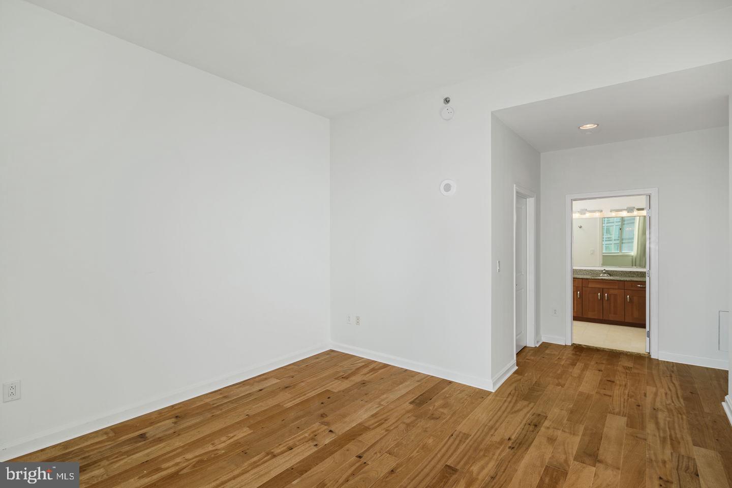 901 North Penn Street, Unit R1802 Philadelphia, PA 19123 - Photo 23 of 32 a view of empty room with wooden floor