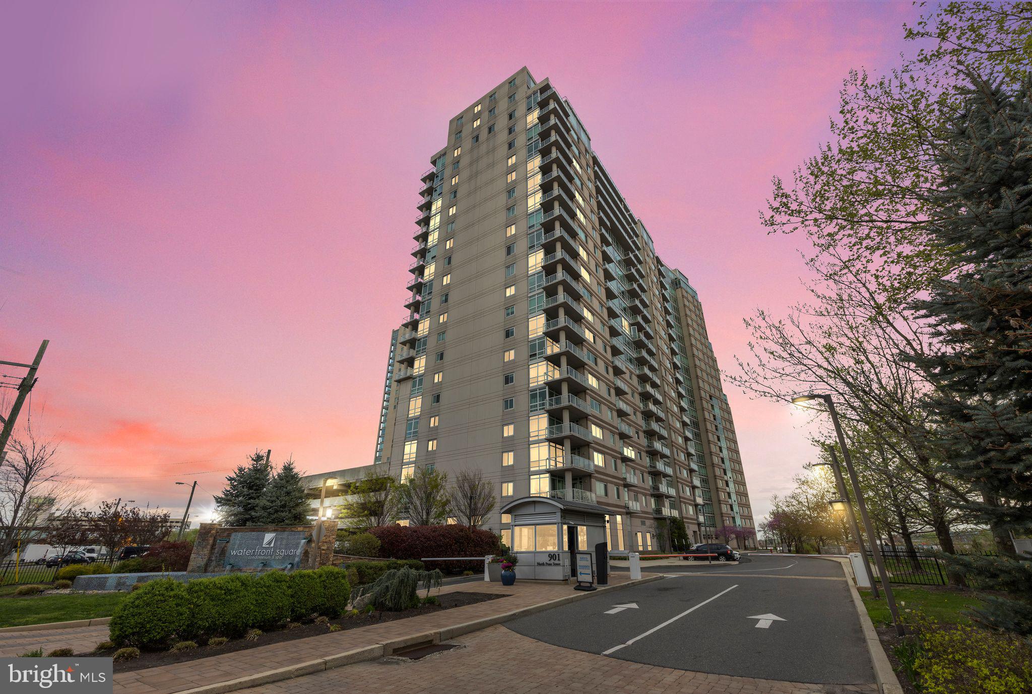 901 North Penn Street, Unit R1802 Philadelphia, PA 19123 - Photo 29 of 32 a view of a tall building next to a road