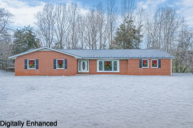 a house with trees in front of it