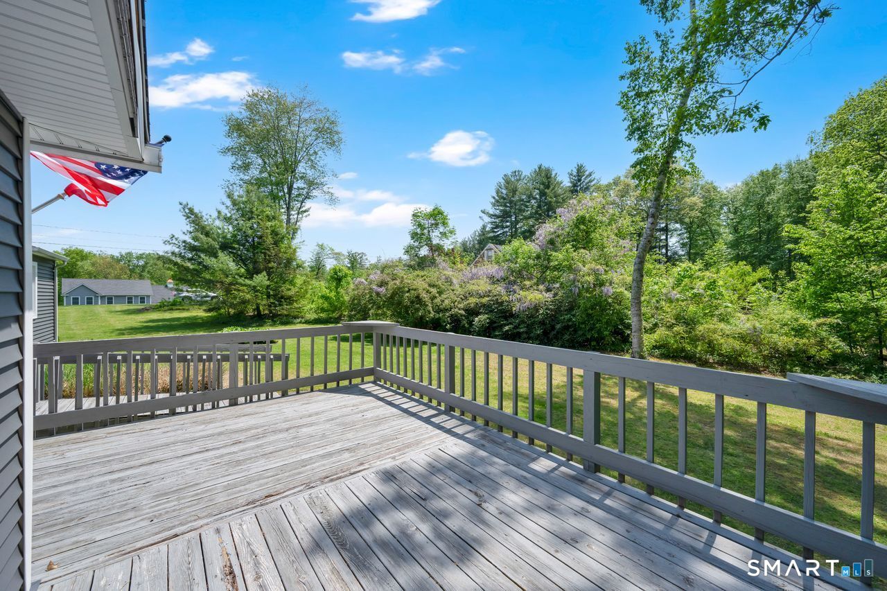1013 Ratley Road Suffield, CT 06093 - Photo 35 of 39 a view of a balcony with wooden floor