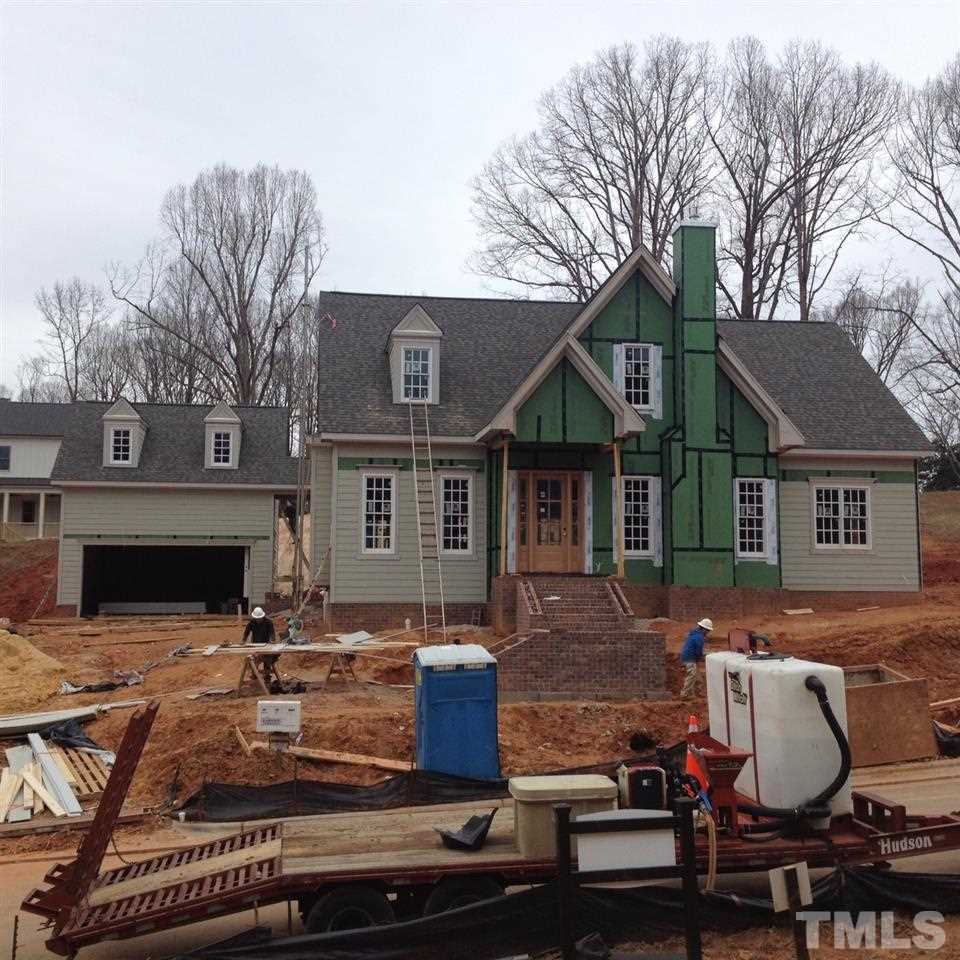 5205 Woodall Way, Unit 19 Raleigh, NC 27613 - Photo 3 of 5 a view of a house with backyard and sitting area