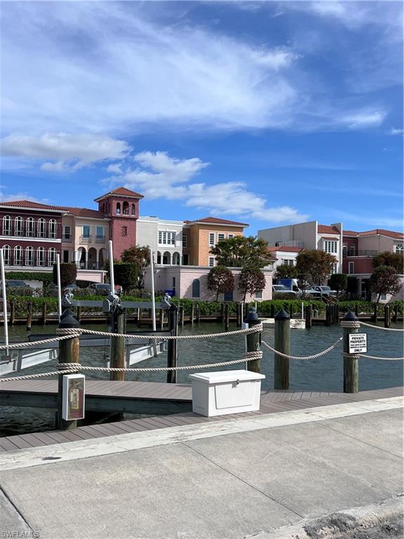 4090 Gulf Shore Boulevard North, Unit 1 Naples, FL 34103 - Photo 2 of 13 a view of city with tall buildings